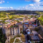 Veduta di Óbidos bellissima città Medioevale con il suo magnifico Castello di epoca romana